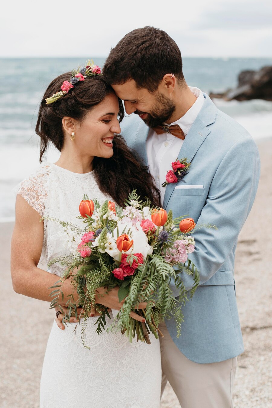 beautiful-husband-wife-posing-beach_23-2149003453